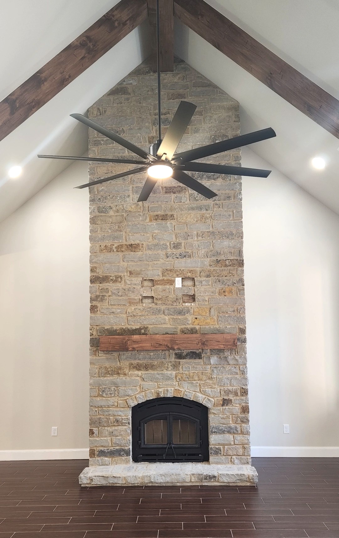 fireplace, rustic fireplace, living room, living room fireplace, vaulted ceiling, beams, living room design, fireplace design, rustic design, interior fireplace