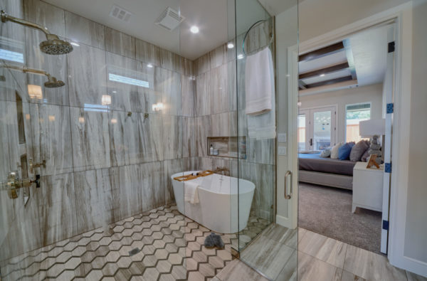 modern master bathroom with tub and shower combined